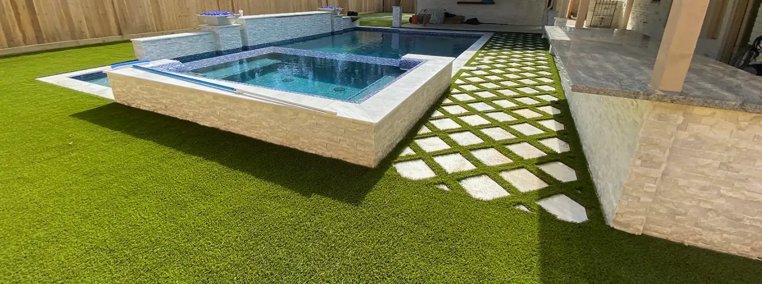 Artificial grass pool area installed by SYNLawn