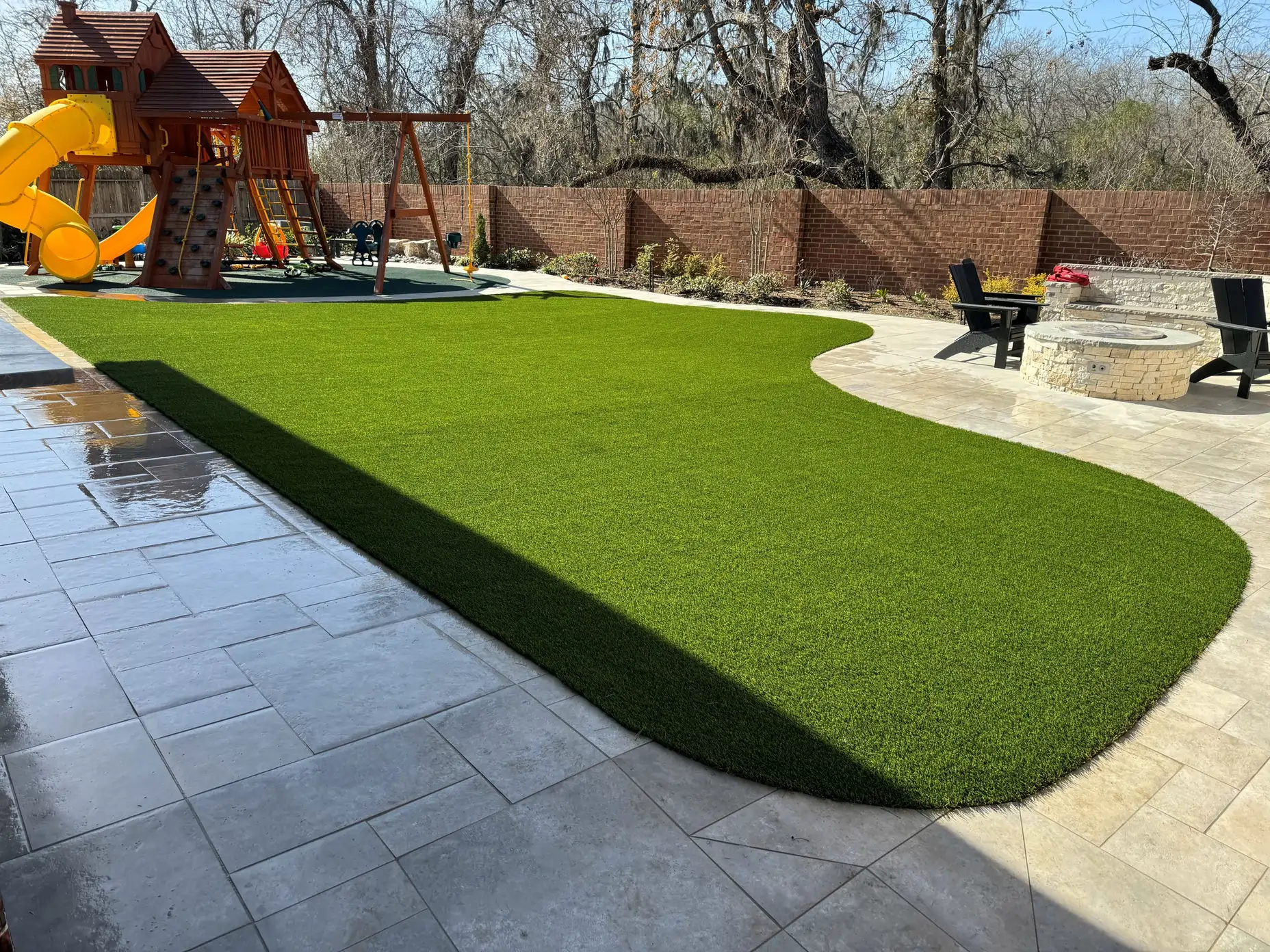 backyard playground on synlawn artificial turf lawn